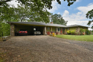 If you wait to see this one...you'll miss out! The possibilities that this 21.87 acre property has to offer is endless! The newly renovated & spacious home features 2,367sf - 3 bed / 2 baths with all of extras that are too many to list but new windows in 2020, has a well, pipe fencing, a pond w/ ducks, fireplace, are just to name a few!The 60x30 shop is HUGE and will hold any from projects, storage, tools, etc. . Insulated, has electric, & plumbed.Schedule your private tour today!