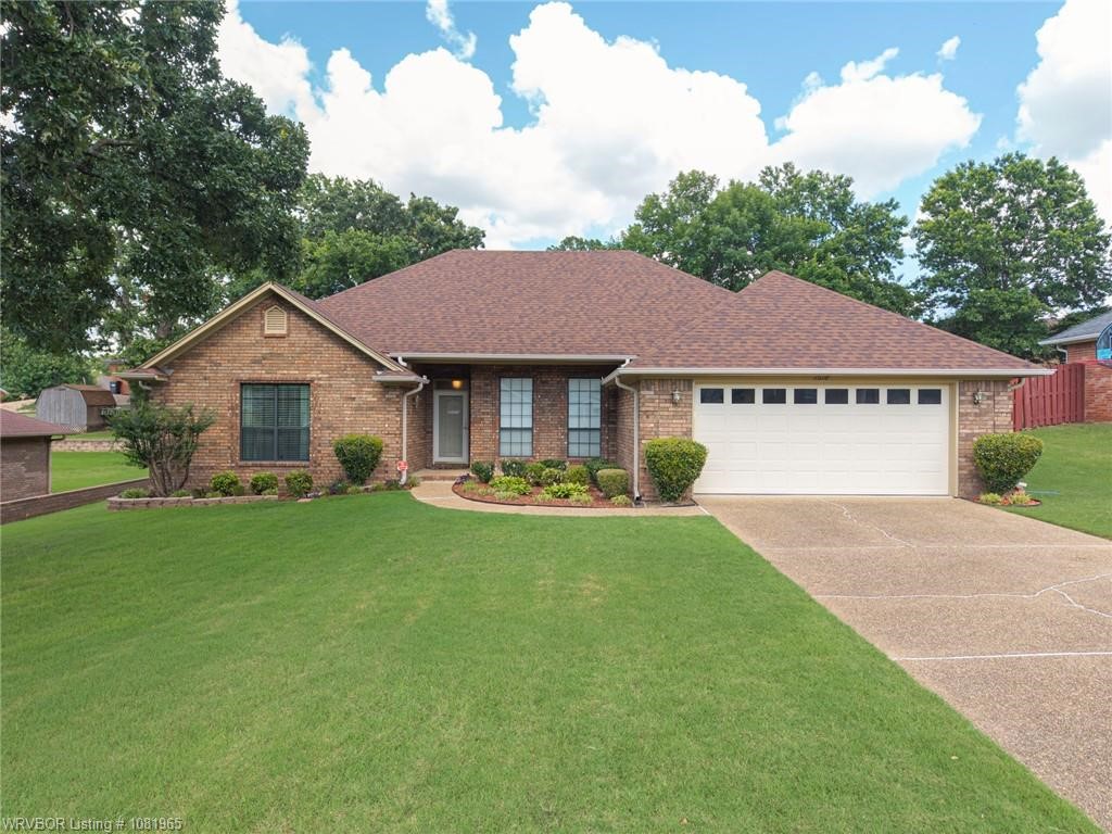Immaculate 4-bedroom, 2-bathroom, one family owned home that is located in a highly sought-after area. 2198 sq ft with large windows that flood the home with lots of natural lighting. The home was beautifully renovated in 2017. Roof replaced in 2019.Water heater in late 2021. Gas furnace in Dec 2024.This residence features: granite countertops in kitchen & hall bath, home has formal and eat-in dining areas with a breakfast bar, SS appliances (washer dryer & fridge to convey), covered front and back porches, a gas log fireplace, central vacuum system, wired for security, keyless garage entry, a split bedroom layout, a spacious master suite that includes a sitting area & 2 walk in closets. Built-in hallway shelving offers additional storage and character. The fenced yard provides ample outdoor space. A large portion of the attic is floored for additional storage. Conveniently located just minutes from shopping and dining while being move in ready. The designer got this one right. Must See to Appreciate!.