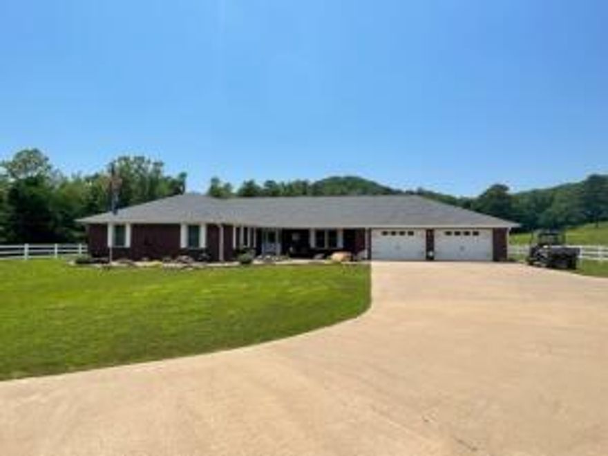 ONE OWNER, HORSE AND CATTLE PARADISE with BEAUTIFUL views in the OZARK MOUNTAIN foothills. This PRISTINE 197+/- acre cattle farm ismanicured and turnkey ready for the new owners. SIX PONDS and THREE CREEKS provide year round water in addition to a MUNICIPAL WATERsupply and a DEEP WELL for gardening/livestock. This CUSTOM BUILT 2600+/- sft home has NEW ROOF w/transferable LIFETIME WARRANTYSEPT. 2021, NEW HVAC MAY 2021, NEW WATER HEATER 2020 and FIBER OPTIC INTERNET. The living space has a large, open feel with 3 beds 2baths open kitchen, granite counters, two pantries, large laundry room and oversized two car garage complete with man-cave.