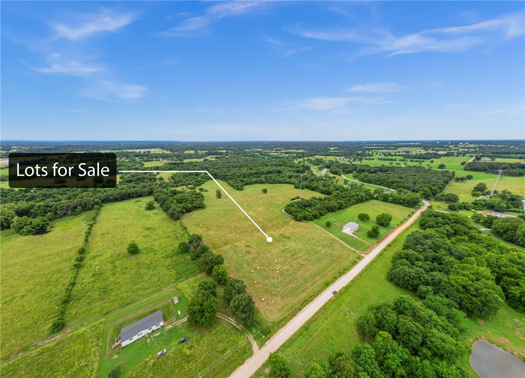 This expansive 6-acre property, featuring two parcels sold together, offers a prime opportunity to build your dream home. The land is cleared, leveled, and ready for construction, saving you the hassle of extensive groundwork. With ample space to design a luxurious main residence, you can create a home that suits your vision. The property also provides room for additional structures, such as guest houses, a hobby farm, or even a vineyard. The peaceful, secluded setting ensures privacy, making it an ideal retreat from everyday life. Whether you dream of a contemporary masterpiece, a rustic farmhouse, or a classic colonial, this property offers the flexibility to design and build a home that reflects your unique style and needs. The dual parcels also provide potential for future expansion, investment, or creating a multi-generational living space. This 6-acre property is more than just land; itās the perfect foundation for your dream home, where you can build lasting memories.