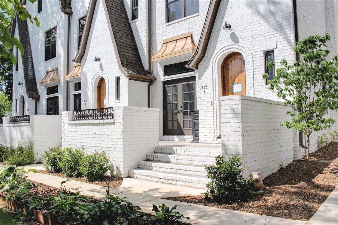 Architecturally designed new construction home located less than a block from Dickson St., and only a few blocks from the Downtown Fayetteville Square and Fayetteville Library. Enjoy the privacy of being off the street while convenient to all of the downtown amenities and the University of Arkansas. The open living and kitchen area on the main level with a guest bathroom is highlighted by the gas range and granite eating bar. On the next level is the owner's suite, laundry and additional bathroom and bedroom. On the upper floor there is an additional bedroom and bathroom and another large living area both enjoying super high ceilings. With each bedroom having a separate bathroom, hardwood floors in the living, kitchen, hall and owner's suite and creative storage areas there is something for everyone.
