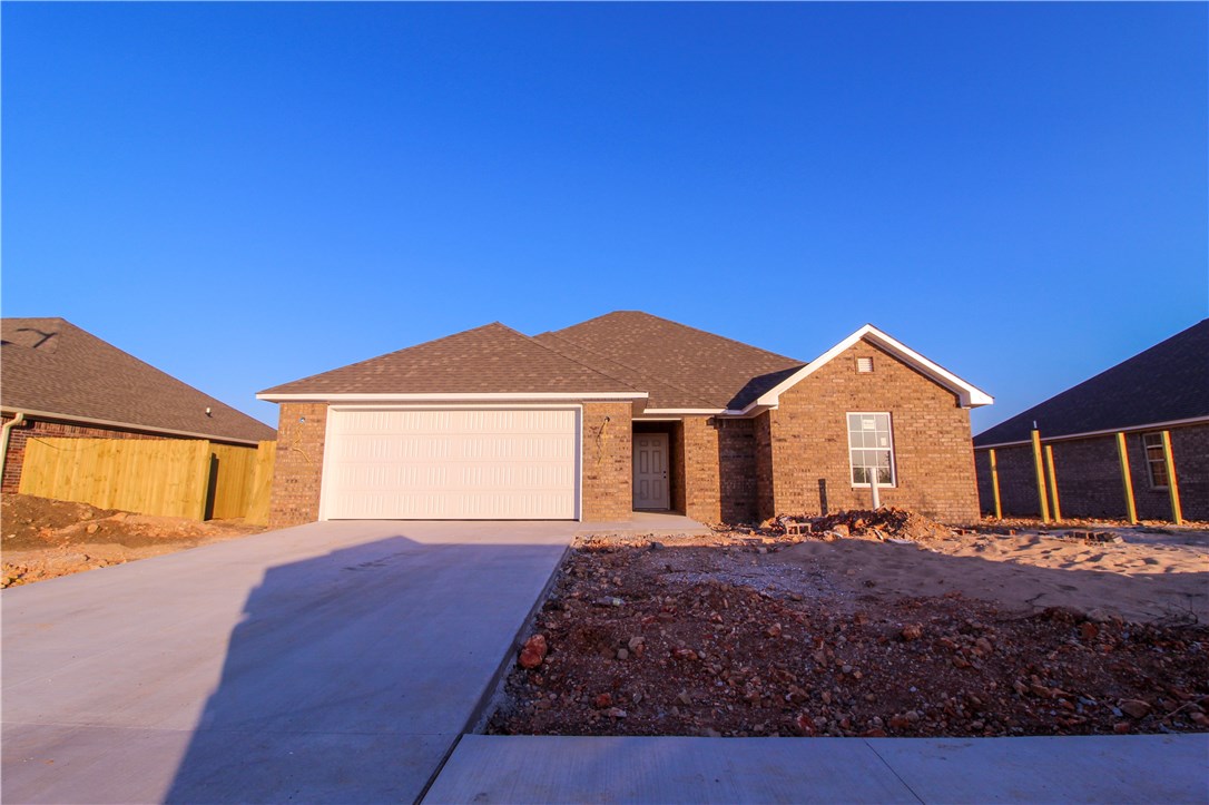 New Gentry Community! Zero down, Rural Development Loan available for eligible buyers! This 3 bedroom, 2 bathroom home boasts 1,488 sq feet of brand new construction. Beautiful dark stained cabinetry and flooring provide a sense of elegant living throughout the home. Each home has an attached 2-car garage and ample closet space in each room. These homes include: Full Blinds, Privacy fence, Stainless steel appliances: Refrigerator, Range, Dishwasher, Microwave,and Garbage Disposal. Washer/Dryer are not included.