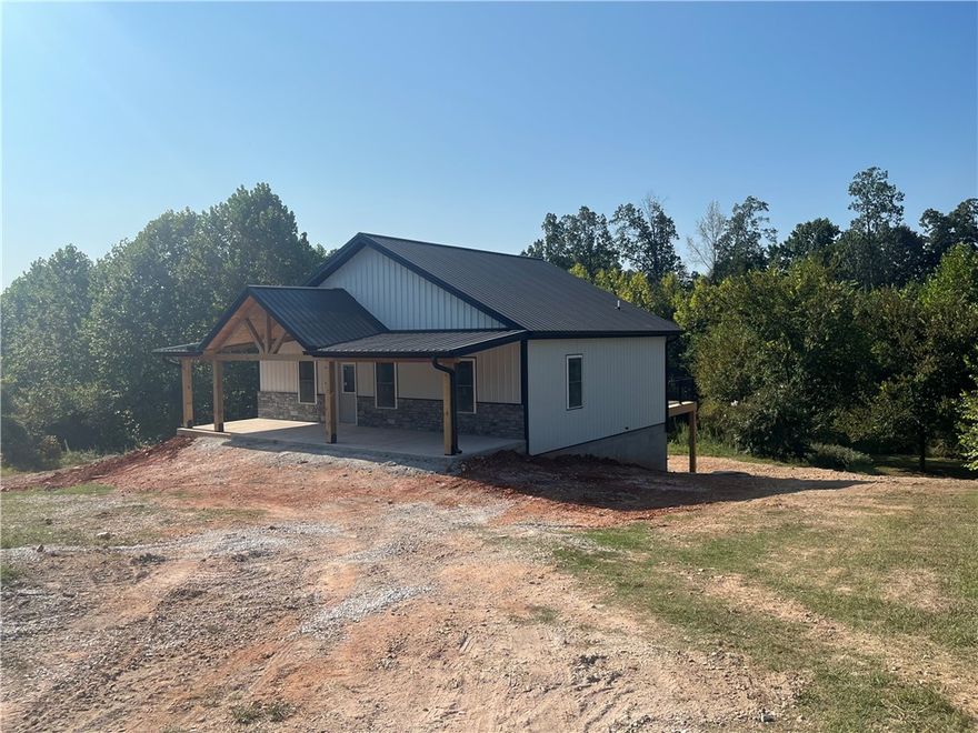 Modern 3-Bedroom Home with Walkout Basement on 1.09 Acres – Near Harrison, AR & Branson, MO

Discover this newly built 3-bedroom, 2-bath home situated on 1.09 acres in a prime location between Harrison, Arkansas, and Branson, Missouri. The home features a covered front porch with a rich wood finish that creates a warm, inviting entrance. Inside, you’ll find quality construction, an open layout, and a full walkout basement—perfect for additional living space, storage, or storm protection.

Enjoy peaceful country living while staying close to shopping, dining, and entertainment in both Harrison and Branson. Don’t miss the opportunity to own a beautiful new home in this convenient and desirable area.