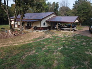NEW HOME on just over 10 AcresThis home has its own ''beach'' right out the front door to enjoy the beautiful sunsets and if you like to hunt you are 5 minutes from Game and Fish property that will take you all the way to the Petit Jean river. This home has two very spacious bedrooms and could possibly be made into a three bedroom if needed.