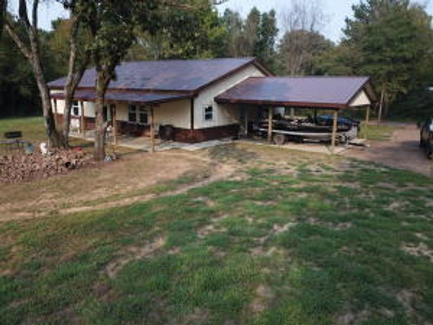 NEW HOME on just over 10 AcresThis home has its own ''beach'' right out the front door to enjoy the beautiful sunsets and if you like to hunt you are 5 minutes from Game and Fish property that will take you all the way to the Petit Jean river. This home has two very spacious bedrooms and could possibly be made into a three bedroom if needed.