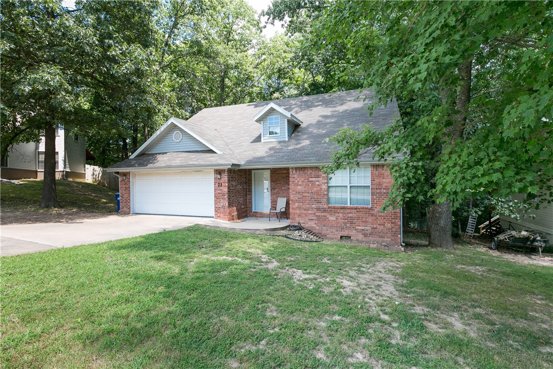 Beautiful 2-story Bentonville home in a great location, convenient to everything. Enjoy the trees & nature sitting on the deck and relaxing overlooking the large backyard. Living room has carpet and gas fireplace with trey ceiling. Great kitchen with stainless steel appliances, gas range, custom cabinets and eat-in area. Upstairs has one bedroom with the rest on the main level. This home will not last long!