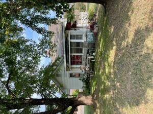 Investor Special!!! This home will be sold AS IS WHERE IS condition. This home does have fire damage located in the upstairs area and also has water damage. The roof is fully intact. With the right set of skills and vision. This home could be rehabbed and brought back to life. It did feature 1200 SQFT living space. With basement. Detached garage currently used as storage and unaffected from fire damage. Located on a corner lot next to St. Joseph Catholic Church in Paris.