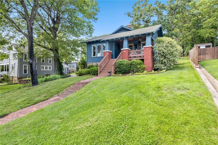 This stunning 1930's charming bungalow has so much to offer. Its inviting front porch gives view to the nearby Ozark Mountains, and with its prime location in downtown Fayetteville, it's a gem for sure! The proximity to Dickson Street, the University of Arkansas, Walton Art Center, and the Fayetteville Square makes it an ideal spot for anyone looking to immerse themselves in the heartbeat of the town. Plus, a finished and spacious basement adds to the home's functionality.  This house also comes with the potential for expansion with architecture plans included. It is the perfect blend of historic charm and modern convenience right in the middle of everything Fayetteville has to offer.