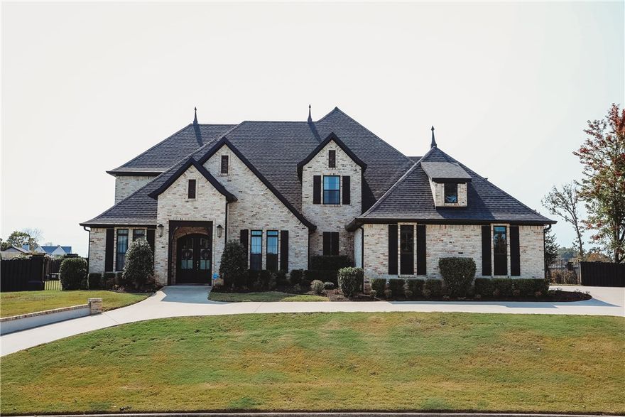 This beautiful home is 4 years young and very lightly lived in. The master suite is magnificent! The master bath is also incredible with a rain shower head and two wall mounted shower heads. Also, a huge soaking tub rounds out this masterpiece of a master suite. The closet is large and very near the washer and dryer.  There's a second master on the main level that could be a guest or mother-in-law suite.  Just off the main entryway is a den with huge windows. Upstairs has two additional bedrooms and a bathroom with a double vanity separate from the water closet/shower. Also upstairs is a huge family room with vaulted ceilings. 
This floor plan is open and inviting. Superb for entertaining. Outside boasts a covered patio with a gas fireplace. 
Come view your new home with a chance to enjoy all the amenities of the prestigious Pinnacle Country Club.