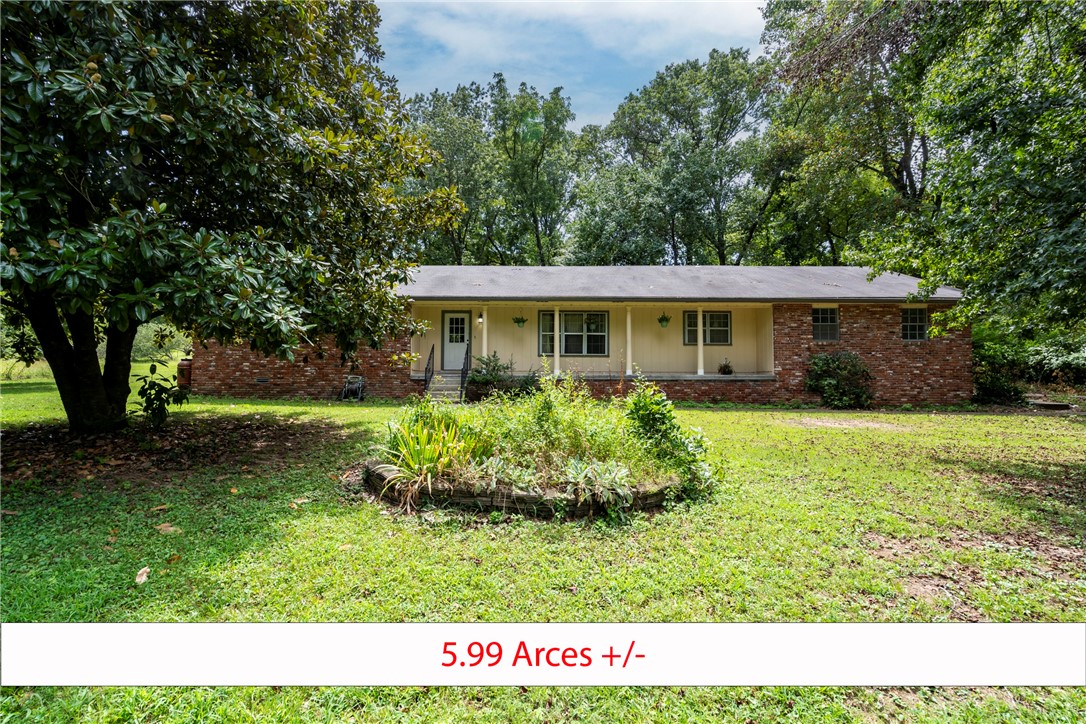 Nestled on nearly six acres just outside of Rogers, this charming brick home offers the perfect blend of peaceful country living and city convenience. Located in the sought-after Little Flock area, the property provides privacy, space, and endless opportunities. Inside, youāll find unique character throughoutāfrom graceful archways to a cozy brick fireplace that anchors the living room. Abundant natural light fills the home, creating a warm and inviting atmosphere. The spacious layout offers comfort and flexibility, ready for your personal touch. Step outside to enjoy open land bordered by mature trees and even a fruit treeāideal for a hobby farm, outdoor activities, or simply enjoying the quiet, scenic surroundings. Despite its secluded feel, youāre just minutes from downtown Rogers.