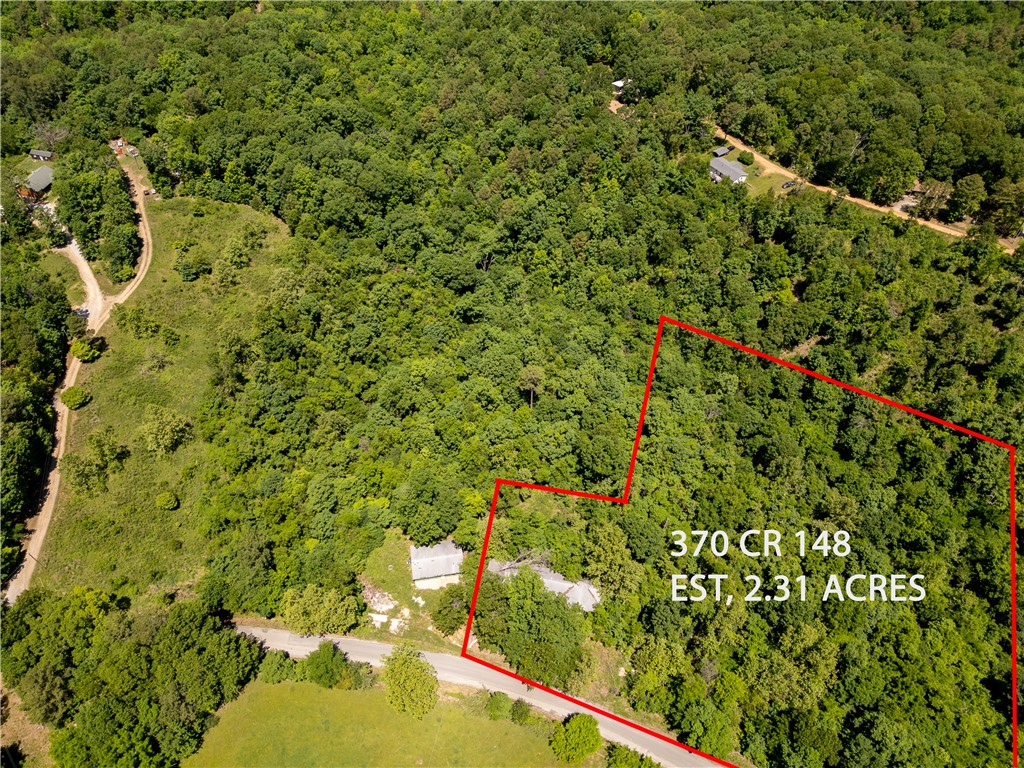 Tucked just minutes from Beaver Lake's Hogscald Hollow and Big Clifty Park, this 2.31-acre unrestricted lot puts you in the middle of everythingāwithout feeling like it. Close to Eureka Springs and 30 min. From Rogers. Whether you're dreaming of a cabin, weekend getaway, or something with more room to roam, the location sets you up to make it happen. Electricity is at the street. Well and septic ready. This kind of flexibility in a spot like this doesnāt come along often. This is beeing bundled with adjecant lot. MLS 1303145