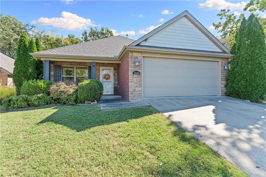 Prime Fayetteville Location Near U of A and Washington Regional! Quality-built Riverwood single story home is all-brick, 3-BR, 2-BA blending comfort, value, and convenience in one ideal package. Minutes from the U of A, Razorback Stadium, shopping, and all the best Fayetteville has to offer, perfectly situated for students, faculty, or game-day enthusiasts. The home features an open, light-filled layout with spacious kitchen and inviting living area. Features include gas range, granite countertops, wood laminate and tile floors throughout, fireplace with gas logs, and spacious 2-car garage. A new roof (2020) adds peace of mind, while the covered porch with privacy-fenced backyard—framed by mature trees, backing to a greenbelt—offers a quiet retreat. The primary suite includes a walk-in closet and private bath. Whether you’re looking for your own home, a game-day getaway, or an investment opportunity, this one checks every box: all-brick, well cared for, and in an unbeatable location!