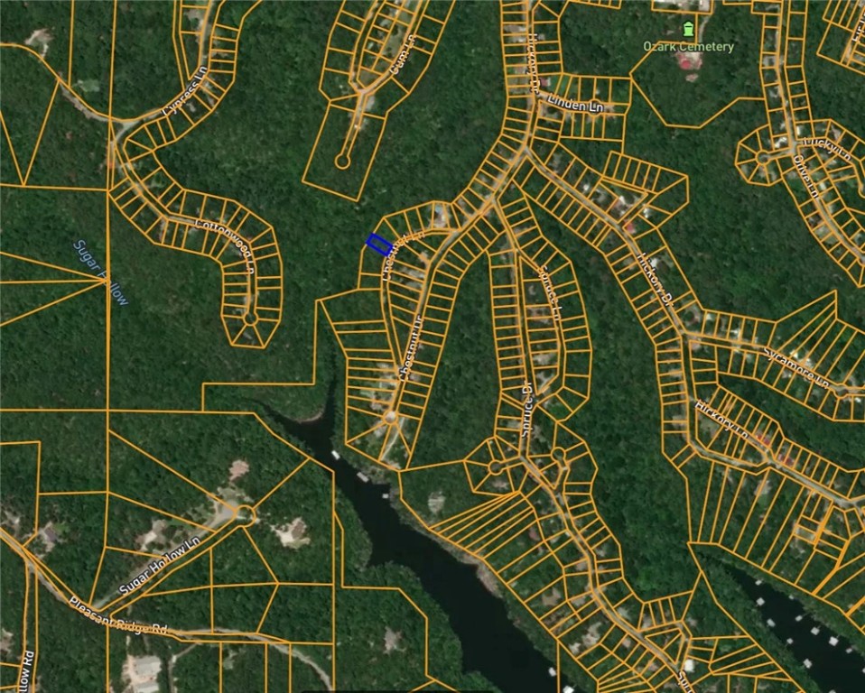 Beaver Lake area lot in the Beaver Shores Subdivision. Very Secluded with a few houses on the street. Prairie Creek Marina and 3 other boat launch ramps located just right around the corner. Minutes to Downtown Rogers. Water and electric at street. Multiple lots available.