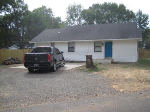 New fence around a nice big yard! Many updates in this great starter home. 3 bedrooms, 2 baths, and a large kitchen.