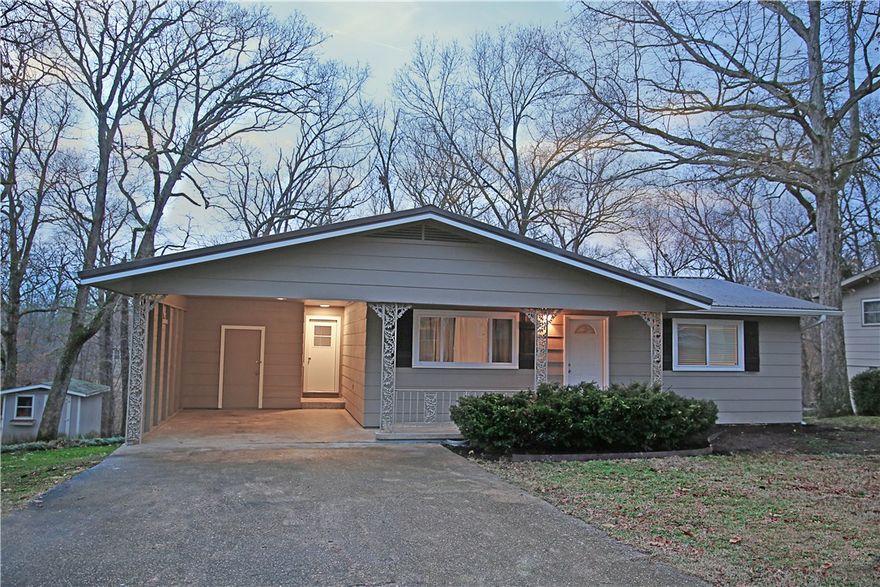Priced to sell!!! Beautiful two bedroom house, totally removated inside & out, fresh paint! Everything in this house is new!! HVAC system, Metal Roof, Septic System, Water Heater, Gutters, Efficiency Vinyl Windows, Doors, Trim, Kitchen Cabinets, Flooring - EVERYTHING IS NEW!!  You will just find perfection in this house - the best materials were used.  Peaceful back deck overlooking the trees!!  Easy Access to HWY 71.