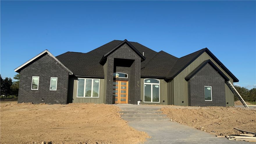 Welcome to your dream oasis! This exceptional new construction home, nestled on a sprawling 3.3 acres, offers a rare blend of modern elegance and serene country living. Located just outside of city limits, this property provides the perfect escape while being conviently close to amenities. With 4 spacious bedrooms, 3.5 luxurious baths, and breathtaking views this home is designed for those who appreciate quality, comfort and style. Schedule a private showing today and experience the beauty and elegance that awaits you!