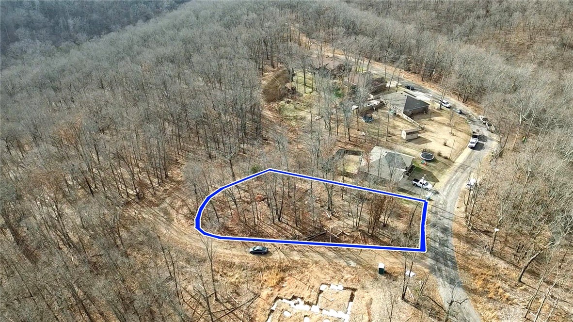 Build your next home on this flat corner lot! The lot is flat in the back so you can have a nice back yard for animals, or a large patio.
This lot perc'd for a 3-bedroom home.