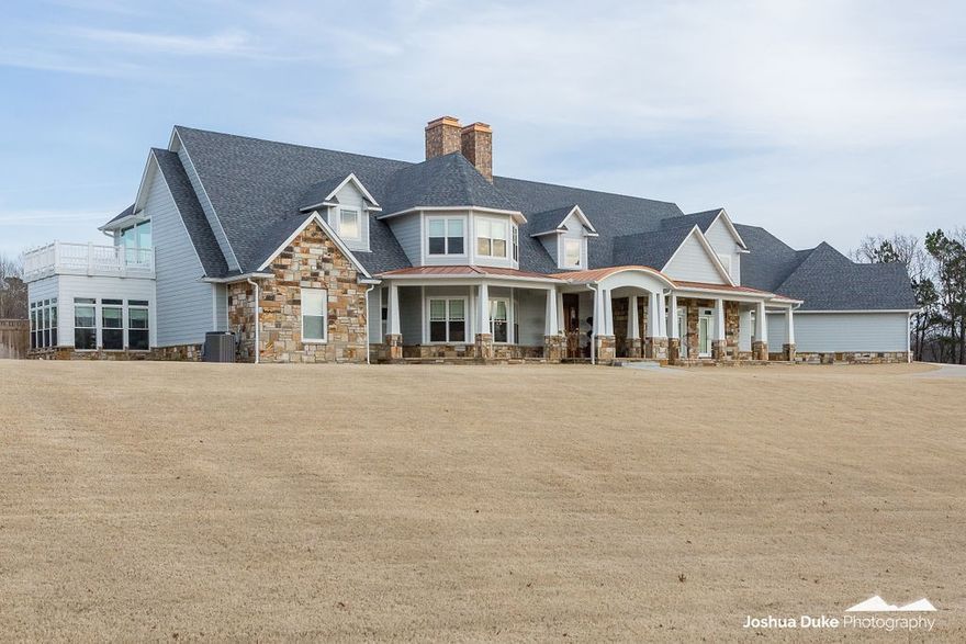 This exclusive and stunning estate property has private gated entry and is located on 4.80 acres. Amenities galore for entertaining and gracious living include a grand open plan on ground floor with panoramic Marvin sliding doors overlooking covered outdoor living space with heated salt water pool, pond with fishing dock, outdoor fireplace and kitchen. The main master Bedroom is perfectly appointed with gas fireplace, two full bathrooms and attached private sunroom. The second master bedroom has private garage access & private front porch access. The upstairs media room provides the ultimate sports watching experience & an extra large game room/gym with views of the pond can let the entire family have fun. The amazing pool house turns into the ultimate cabana style entertainers delight with full kitchen & bath. Other amenities include elevator, storm shelter room, whole house generator and all en suite bedrooms & bath.