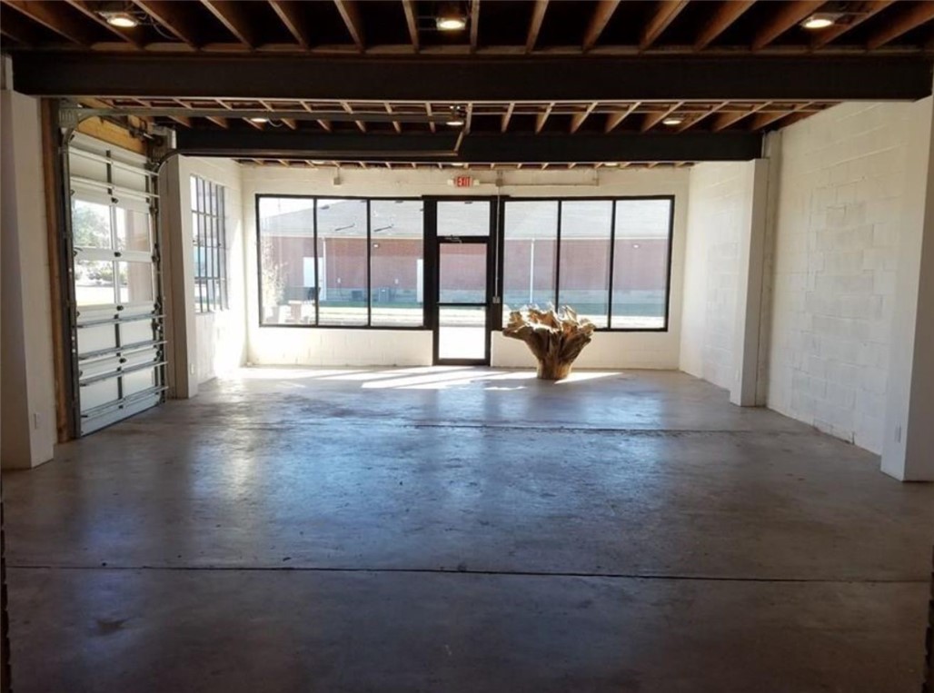 Wood Stroud Add Rogers - Commercial Lease