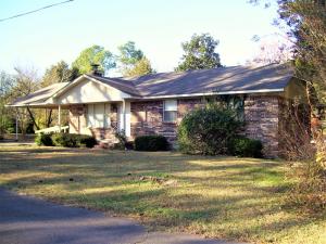 THIS 3 BR 2 BA BRICK HOME HAS BEEN VERY WELL CARED FOR!! Located close to the University, this good sized home on a corner lot would make an excellent first time home, or, a very nice retirement home. You get a nice gas log brick fireplace, a very large utility room with a pantry, a detached brick garage, and an attached carport. Don't wait too long, this one will go quick!!