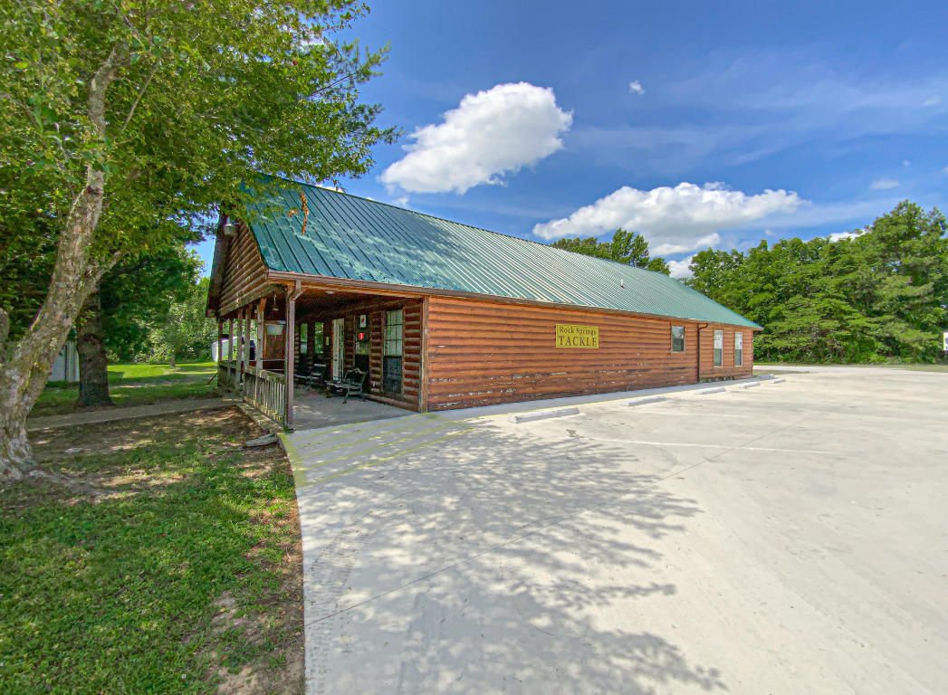 Great opportunity for this up and running business or just the real estate in a great location for your own business. This 1800 sqft building sits on a spacious and level lot of 0.86 ac. Some amenities include concrete parking and a packed gravel turn around location, free span open floor plan, outbuildings, and more! All of this in a great location across the road from Fed-Ex Freight. Price is for real estate only, but can be purchased with business and all inventory for $399,900.