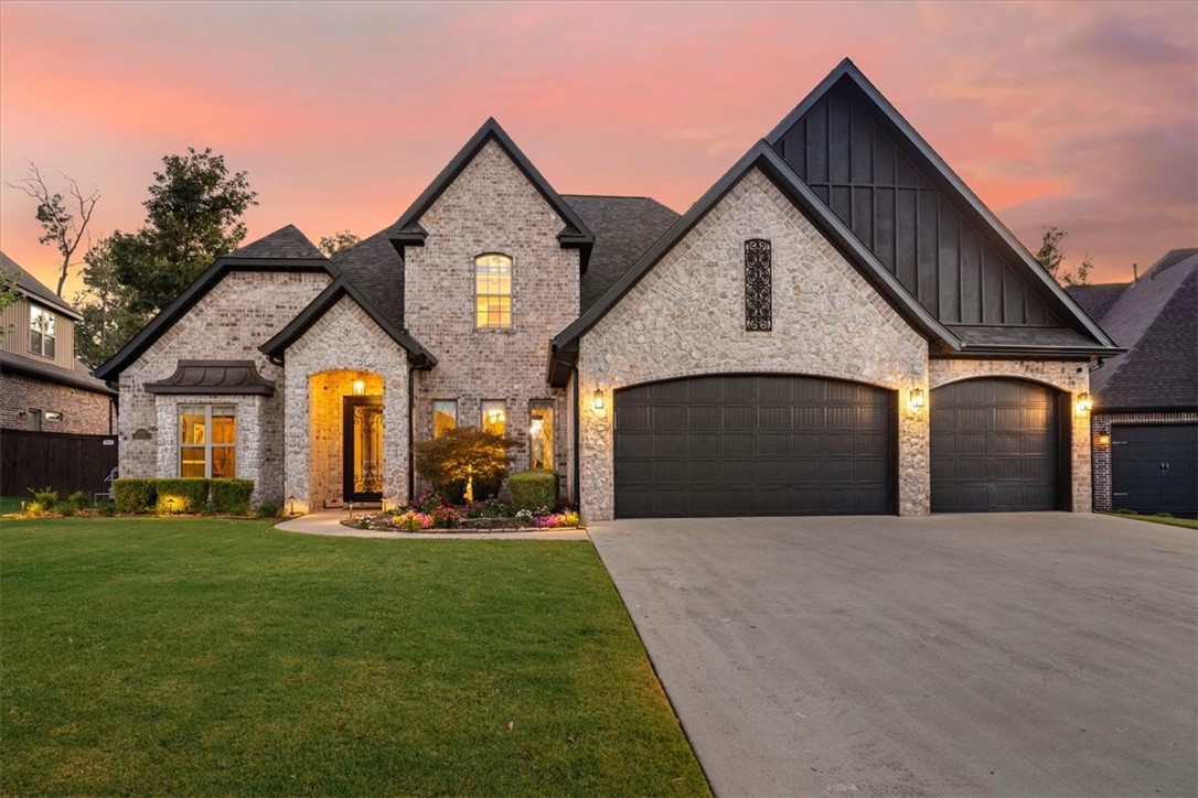 Welcome to the Estates at Woods Creek - luxury living in the friendliest of subdivisions just 5 minutes to the new WalMart campus, world renowned bike trails, the art and exhibitions of Crystal Bridges museum, our city park, and schools. Three miles to downtown chef inspired restaurants! Nestled on .71 acres on a culdesac, this exquisite 4,477 SF home is waiting for you to entertain your friends and family. This custom home's main floor features a formal dining room, large open living area with fireplace, spacious kitchen with granite counters, an abundance of cabinets and large island for gathering guests plus a casual dining space. An office has been converted to a wine tasting room. Your spacious primary bedroom and bath, a guest bedroom and bath and a 1/2 bath complete the main level. Upstairs you'll find 3 additional bedrooms, 2 baths and a fabulous home theater room! Step outside to your outdoor oasis! Barbeque in your outdoor kitchen and relax in the spa and heated pool. Live the Bentonville dream here!