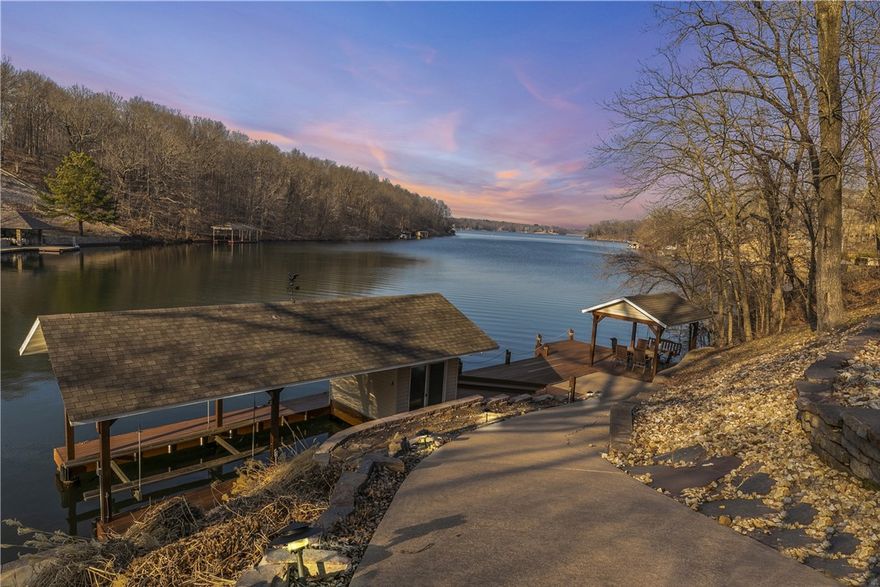 Located on a private cove where entertaining is abundant! Don't miss this well cared for home, its a charmer up stairs and down.