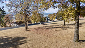 Build Your Dream Home with Stunning Lake Views!Nestled on a scenic hillside with breathtaking views of Lake Dardanelle, Lots 81 and 82 offer the perfect opportunity to create your dream home in the prestigious Pleasant View Estates. Whether you're envisioning a cozy retreat or a spacious forever home, these lots provide the flexibility to suit your vision.Available individually or together for a larger footprint, these properties combine natural beauty with convenience, located close to shopping, dining, schools, and recreation. The elevated terrain enhances the lake views and allows for unique home designs, such as multi-level layouts or expansive outdoor spaces.Ideal for families, retirees, or anyone seeking a peaceful yet connected lifestyle, these lots are a rare find.