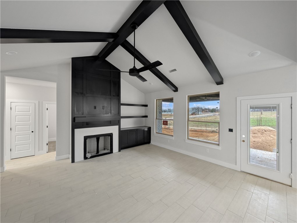 Welcome To Your Next Home! Welcome To The Brand New Spring Creek Farms Cave Springs/Lowell/Springdale. This Fantastic New Neighborhood Will Feature Amenities Such As Pool And Playground In Phase 3. This New Build Offers Full Brick Exterior, 4 Bedrooms, 3 Car Garage, Covered Front Porch And Back Patio w/ Gas Grill & TV Connections. Vaulted Ceiling In Living. Custom Cabinets And 3cm Granite Throughout. Kitchen w/ UC Lighting, Pantry, Tile Backsplash, Eat-in Dining + Bar/Island Seating. Primary Suite w/ Tray Ceiling. Primary Bath Offers Full Custom Tile Shower, Dual Vanity, Walk-in Closet. Split Floorplan. Wrapping Up March 2025.