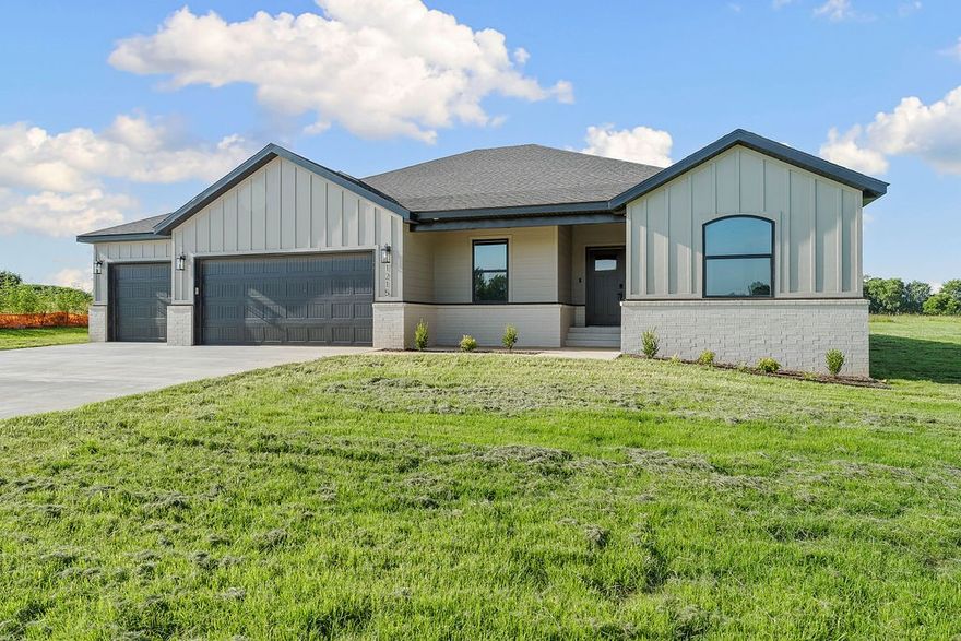Modern Elegance Meets Country Living – New Construction on 1 Acre Lot. Step into refined luxury with this brand-new, single-level home on a full acre. Designed for comfort, style, and function, this thoughtfully crafted home features 4 spacious bedrooms, game room, and 3-car garage. Inside, you'll find custom cabinets, detailed trim, and designer finishes throughout. The living area is filled with natural light, complemented by sleek LVP flooring and a modern feature wall. Kitchen has quartz countertops, large island, and a walk-in pantry. Retreat to the spa-like primary bathroom with a freestanding tub, dual vanity, and striking tile accents. Every room showcases craftsmanship, from the game room to the functional utility spaces. Set on level lot, there's room to breathe, entertain, or add a shop. Convenient location, minutes from downtown Bentonville.  Seller will provide 7,500 concessions plus an additional up to $5K from preferred lender for a total of $12,500.