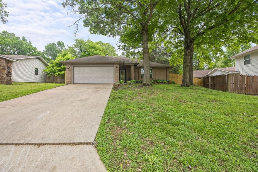 Welcome home! Charming 3-bed, 2-bath home in an AMAZING location! This well-maintained property features an open-concept living area, updated flooring, and a cozy fireplace. The kitchen boasts stainless appliances and ample cabinet space. The spacious primary suite includes a large closet and private bath. Enjoy the fully fenced backyard with a new back patio—perfect for relaxing or entertaining. 2 car garage and laundry room. Conveniently located, move-in ready and waiting for you! This is one you won’t want to miss, schedule your showing today!