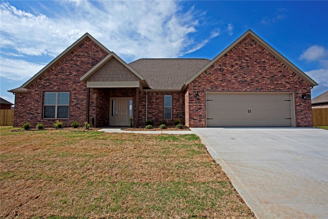 Beautiful home in Pea Ridge. 3 bedroom 2 bath home with split floor plan. Wood style tile flooring through main living area, carpet in bedrooms, granite counters in kitchen and baths, gas fire place in living room, fenced back yard with covered patio.