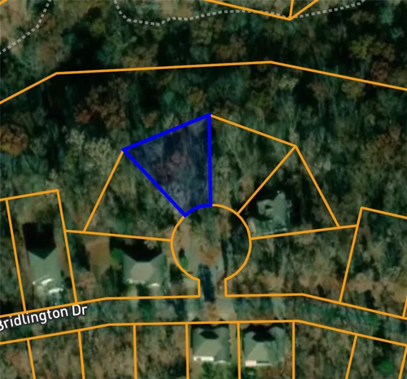 Nestled in the scenic woods of Bella Vista, Arkansas, this 0.27-acre parcel is part of the tranquil York Subdivision . Located on Lyme Lane, this wooded lot falls under the Bentonville School District. This wooded lot and the surrounding area maintains a quiet, forested character typical of Bella Vista’s residential landscapes, offering an ideal setting for those seeking a peaceful retreat surrounded by nature.