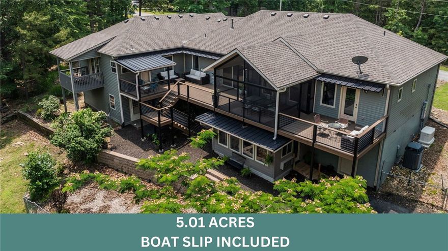 Welcome to Your Beaver Lake Oasis, this is more than just a home, it offers a lifestyle. 5.01 acres of privacy. Buildable lots available next door and across the street. Hop on the golf cart (conveys w/ the home) and be at your boat slip in minutes. The semi-open layout seamlessly connects the dining area, living room, & kitchen. The kitchen overlooks a sprawling deck that is excellent for entertaining or relaxing after a long lake day. The main floor features two primary suites. Second suite is complete with a full bath, living space, kitchenette, & private deck. Off the kitchen is a versatile office space. Downstairs, is a finished bonus room & full bath. Perfect as a game room, workshop, guest quarters, etc. Outside, additional bonus space with its own entrance that could be a home gym/movie room/etc. Ask for the full list of improvements! Whether you're looking for a peaceful full-time residence or a weekend escape, this home has it all! *Additional boat slip and 2.60 acres across the street also for sale.*