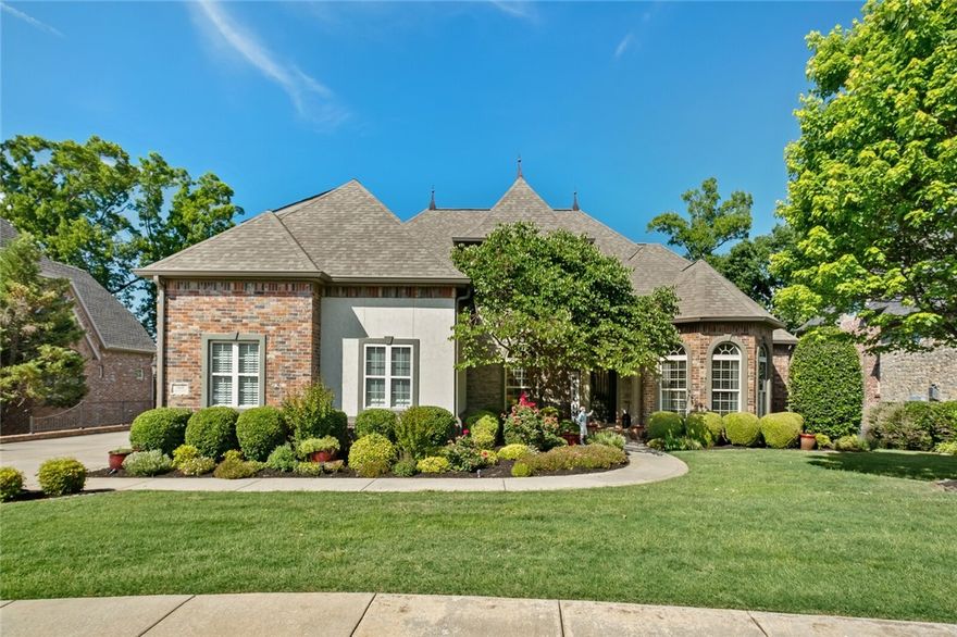 Located in Shadow Valley Country Club, this pristine, golf front, 5-bedroom home offers amazing amenities throughout its updated designer interior! Sought out floorplan with spacious open living concept featuring large great room with fireplace open to Dining Room and Kitchen. Chefs eat-in kitchen with island, top-of-the-line stainless steel appliances including double ovens, gas range & walk-in pantry all open to the eat-in area with access to a covered outdoor living space overlooking the golf course. Enjoy the owner’s suite with spa like bathroom & closet plus a second guest suite/office on the main level.  Second level hosts 3 bedrooms with 2 full bathrooms & a large bonus/game room space & theater with kitchenette featuring a mini refrigerator & microwave. Relax and entertain outside in the fully fenced, private backyard while taking in magnificent golf course views. Other features include a large laundry/mudd room with bathroom & cubbies & 3 car garage. Located in Bentonville Schools.