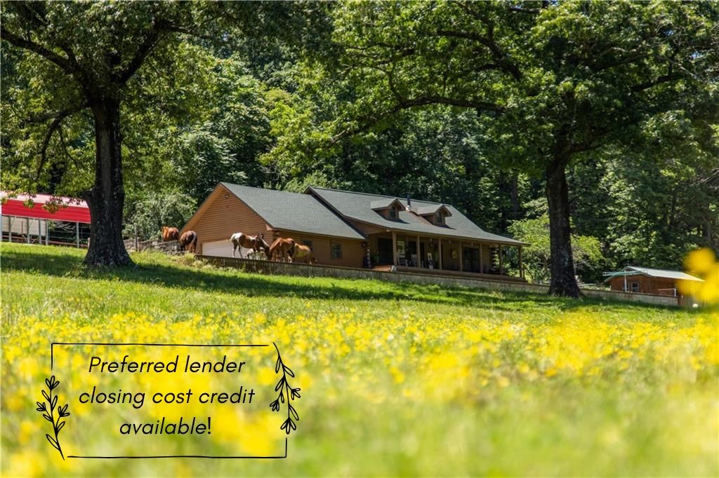 Charming Log Home Retreat on 88.35 Acres Discover the serenity of this well maintained log home nestled on 88.35 acres of breathtaking landscape. With stunning views and abundant natural beauty, this property is a true haven for nature lovers, farmers, and hunters alike.The land features approximately 46 acres of woods and 42 acres of lush pasture, ideal for cattle, horses, and goats, complemented by cross fencing for optimal management. The well-maintained property boasts three barns, providing ample space for storage and equipment. Enjoy the outdoors with three stocked ponds and a year-round spring creek.The log home itself has been beautifully renovated, offering modern comforts while retaining its rustic charm. The main floor hosts spacious bedrooms. A walk-up loft, currently utilized as a bedroom and office, offers additional living space and stunning views. ASK about the perfered lender credit for closing cost or prepaids.