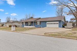 Take a look at this beautifully remodeled home across from the golf course. In a well established neighborhood, this 3 bed 2 ba home is just waiting for you to come and see. With a 20 x 24 shop building, a privacy fenced yard and a 2 car garage, this is the perfect home for you. This home boasts a plethora of upgrades inside and out. WAY too many to list here. Take the time to see the home you have been looking for. Welcome home!