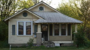 ''IT'S A BIT OF A FIXER UPPER....BUT WITH A LITTLE FIXING IT CAN BE GOOD AS NEW.'' HISTORICAL 2BB/1BA HOME FEATURING ORIGINAL HARDWOOD FLOORS ON AN EXTRA LARGE LOT. SELLING ''AS-IS''