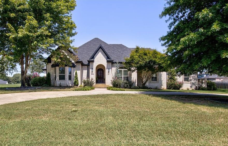 Completely renovated, remarkable home on Fayetteville's West side! This home will not disappoint, offering a large open, split floor plan. Elegant Kitchen features granite countertops, Zline gas stove & microwave, ceramic farmer's sink, Numerous cupboards providing ample cabinet space. Kitchen flows into the spacious living room, a sanctuary for relaxation & quiet moments by the fireplace. Primary Suite boasts size & sophistication, with a tray ceiling, & large En Suite bath, showcasing a tiled walk-in shower, jacuzzi tub, double vanity, & two large closets. For added convenience, there's a second washer/dryer hookup in the primary closet. 4 bedrooms are located on the main level, and a bedroom with a HUGE Bonus room are located on the second level. Home has a 4 car garage, exterior is all brick, with newer roof, gutters downspouts, facia/soffit & both HVAC units are new within 3 years. Outside you'll find a landscaped, level yard with deck & pergola!