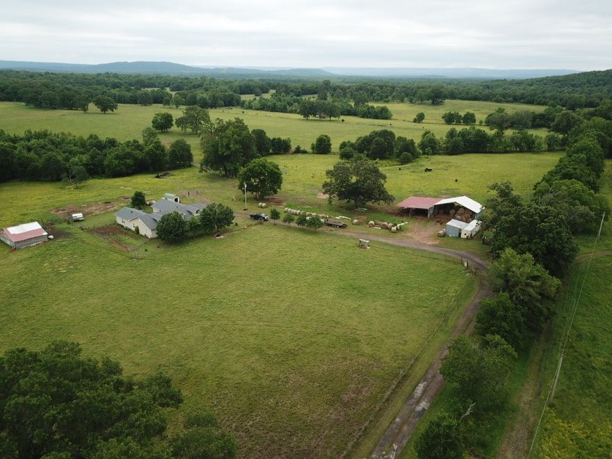 Presenting a generous 4- bedroom home featuring a sizable kitchen and a roomy living area enhanced by a cozy wood burning stove. The delightful covered front porch serves as a perfect retreat for enjoying the beautiful outdoors.
This impressive farm offers over 82 acres of lush pastureland, accompanied by various outbuildings for added utility. 
Nestled at the end of a peaceful dead-end road, this property ensures a serene environment free from traffic noise. This home also had a new roof put-on in 2024.