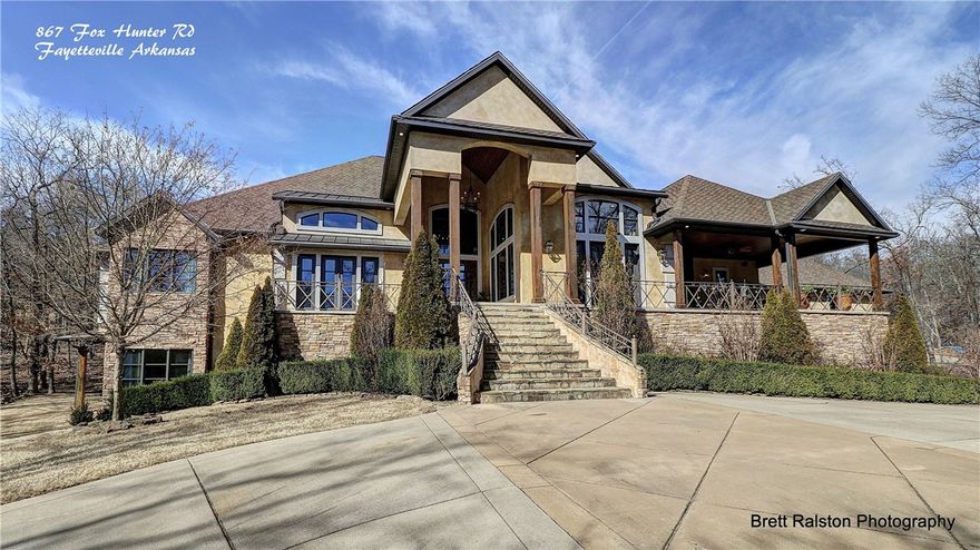 Fabulous estate home situated on 18.65 beautiful wooded acres offering great views from the front porches & serene location.  Home was custom built w/attention to detail throughout. Formal living & dining rooms, office w/built-in cabinetry, amazing kitchen, casual dining & den w/FP.  Large walk-in pantry.  Wet bar.  Master w/sitting room & amazing closets.  1st guest BR upstairs.  Lower level features den & 2 BR.  Quality construction. Geothermal heat & air. 2400 detached shop building.