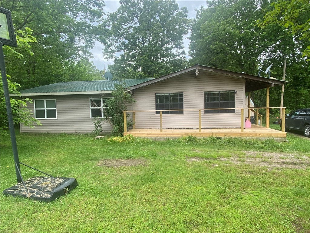 Great opportunity to purchase an affordable home in Siloam Springs school district, possibly even turn it into a commercial option? Highway 59 frontage, house with 3 br/2 ba add some new paint and flooring for a new look! The 10x16 storage building will stay, the lot is a smaller lot, but sellers have used the back for years without any interruption. New deck, City of Siloam utilities (will prorate in the winter at 60 cents per kw instead of 90 cents), well is around 650 ft deep, new hvac in 2009, rewired and plumbed around 3-4 years ago (including new pump). Seller is offering $3k in lieu of repair items, closing costs, paint, whatever you wish to use it for! Great starter home! Come see what Siloam is all about!
The add on completed in 2009, minutes from the Illinois river/floating and water parks on all sides, East, west and south, 10 or less minutes to Siloam Springs schools and Walmart or harps. Country with the perks of town!!