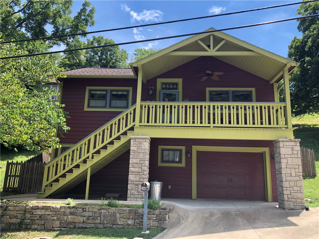 Heart of the city, less than a block from downtown, right in the middle of things. Walk to the park, post office, galleries, springs and restaurants. 
Newly built in 2012. Radon remediation system, water softener, full house water filter, R/O filter in kitchen. Textured walls, maple hardwood floors, and custom cabinets. Fireplace ready for gas insert. Covered front porch, tight rear slab, and manicured yard. 
Charming newer build efficiently designed with garage on lower level. One of a kind in the area.