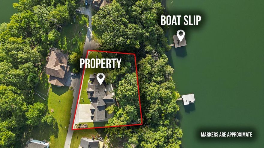 Lakefront Luxury Awaits! This custom-built, one-owner home sits just minutes from Prairie Creek Marina and includes TWO boat slips on a private dock with Solar for electricity. Offering 3812 sq ft of lakefront living, 4 bed, 2.5-bath home features seasonal Beaver Lake views. Enjoy a spacious kitchen with a custom gas range, large island with bar seating, an additional large bonus room- currently used as a pool room of the kitchen and a large living room with a gas fireplace. The primary suite features gas fireplace, private deck access with a hot tub. Upstairs, a flexible space serves as a 4th bedroom or additional living/game room. This home comes with incredible extras, including a whole-house generator, a covered front porch, a 3-car oversized garage with a 4th bay, and a wraparound driveway. Minimal yard maintenance with a Corp line near the back means more time to relax and enjoy the lake. Don’t miss this rare opportunity to embrace the lake lifestyle—summer on Beaver Lake is just beginning!