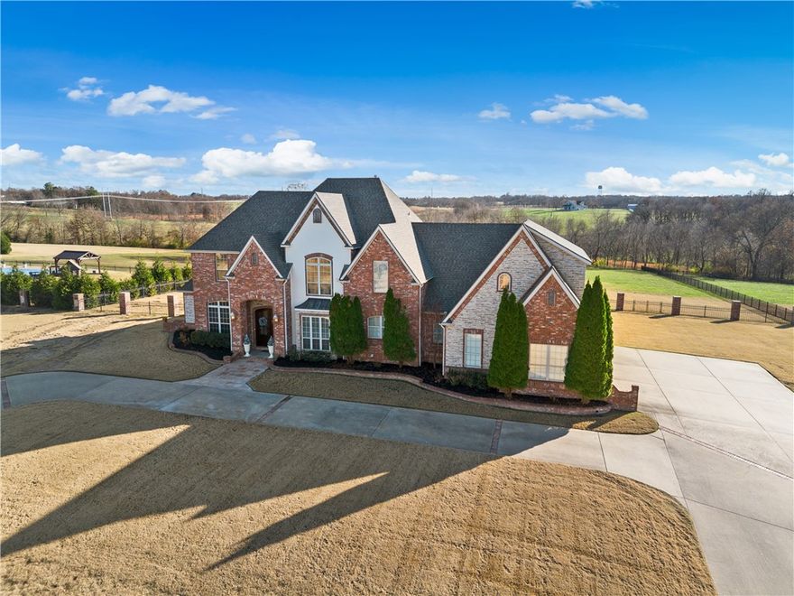 Elegant home in the prestigious gated community of Churchill Downs featuring 2 acre lot & over 5500 sq ft of living space. Main level includes a dedicated office, formal dining room, formal living room with gas fireplace, den with wood burning fireplace, & privately tucked away full guest bathroom. The gourmet kitchen is equipped with 5 burner gas range, double ovens, trash compactor, coffee bar, pantry, & is centrally situated offering the host & their guests the perfect gathering space. The 2nd level includes 2 additional ensuite bedrooms, 4th bedroom, guest bath, an oversized bonus room or possible 5th bedroom complete with laundry chute/mini fridge/sink. A 2nd upstairs bonus room offers an ideal space for home fitness. Outside you'll enjoy a large back patio, fenced in yard with private expansive views, lighted pool with fountains, cabana, & room for lounging. New Roof in 2024. New hot water heater in 2023 with hot water recirculating system.