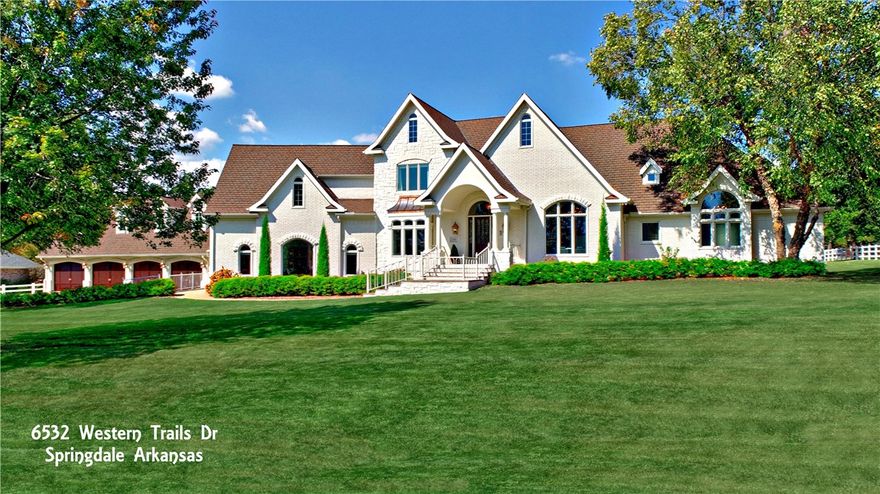 Spectacularly rare opportunity just 5 mins from I-49 and 5 mins to Fayetteville in the coveted Western Trails Equestrian community! Enjoy 6,310 sq ft of renovated luxury on 2 level acres. 5 beds or 4 + office, 2 primary suites, 3 full & 2 half baths, huge bonus, formal dining, family, living, & flex rooms, tons of storage, 2 laundry areas, screened porch & a giant 4-car garage w/ two 12’ & two 10’ doors. Roof features CertainTeed shingles w/ the look of slate; composite deck has copper railings. 30’x40’ Morton building includes 2-car garage & shop. Entire home sealed with Italian Romabio masonry paint. Top-tier finishes: Sub-Zero fridge, Thermador pro range, expansive 6’x10’ island, hammered copper sink, Wood-Mode cabinetry, Schonbek chandeliers, Anderson windows, Hunter Douglas power shades, and enhanced Ethernet wiring. Rare blend of elegance, function, and space—this one truly has it all, in a location that can’t be beat.