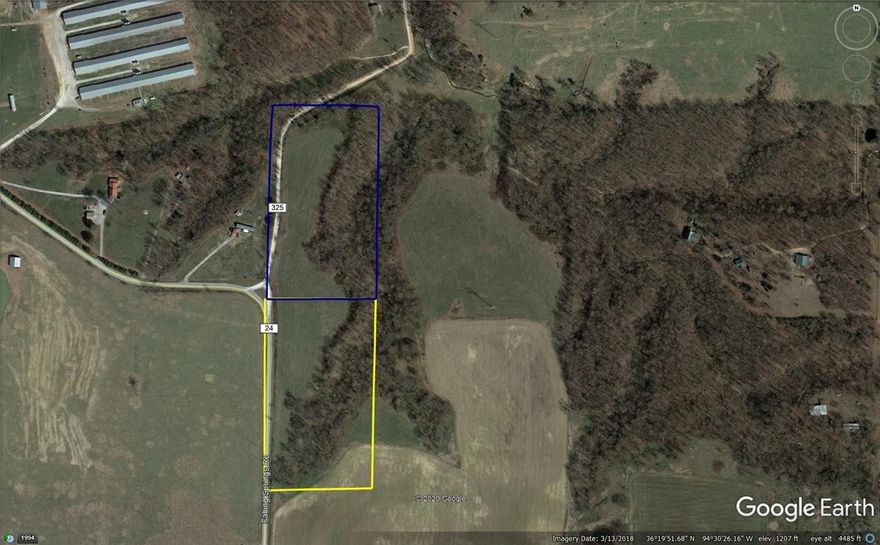Home wanted.  Here is 9 acres, on paved road, with rural water, natural gas and electric at the street.  All of these great amenities while still giving you a rural country setting and only 4 miles from town. Lot 1 is referenced in blue.
