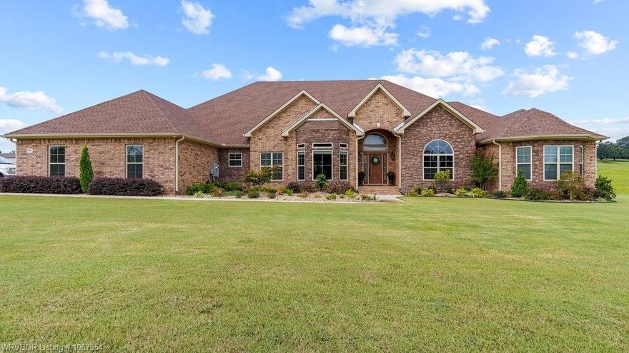 ONE OF A KIND PROPERTY! Luxury Living awaits only 12-15 minutes from Fort Smith's East side. Beautiful 4 Bedroom, 4 Bath Home on Approx. 5.65 ac.., including a 30'x30' Metal Shop and Stocked Pond with lighted Water Feature! Great Home for hosting large Family gatherings or Entertaining friends, this spacious home will not disappoint! Kitchen has High-end Appliances and Amenities! Professional Grade Range (Five Star), Warming drawer, Ice- makers, (Sonic Ice), Wine Cooler, Mini Fridge, Coffee Bar, Trash Compactor, and one of THE BEST Kitchen Pantries you'll ever find, with Pull-out drawers, Lazy Susan and enough room for a full sized freezer or extra fridge! Furniture Grade Custom Cabinetry and Trim Work by Specialty Woodworks. Outdoor Kitchen/ Living Space with Stainless Steel, self contained Cabinets and Drawers. Home has been wired for a Hot Tub and Home Generator. Double Sided Rock Fireplace inside the Home with gas logs and electric start and another one on the Covered Patio that is Wood Burning w/gas starter..