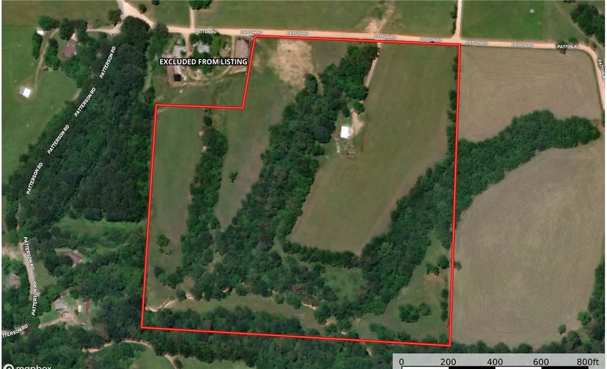 Nearly 37 acres on the North side of booming Pea Ridge.  Don't miss this opportunity.  Mixture of pasture and rolling woods.  Several possibilities awaiting your dreams.  Rural water just down road on Patton Road.  There is a 3 bedroom 2 bath 1997 mobile on home that is included in price.  Updated metal roof.  Rural water or well would be needed.