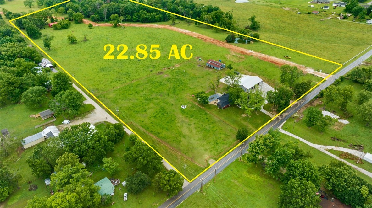 23 Acres fully fenced horse property or farm ten minutes from Downtown Rogers. This incredible property offers the best of both worldsāpeaceful, wide-open space with all the creature comforts of a modern, move-in ready home. Bring your horses, your hobbies, and your love for the outdoorsāthis one is a rare find!The newly remodeled home has a split floor plan with open-concept living area perfect for entertaining. The kitchen is sleek and functional, and make sure to take note of the custom cabinets. Outside awaits your private backyard oasis with an in-ground pool. Steps away, find a climate controlled workshop complete office, half bath and exercise room (or apartment). There is a barn with water and electric with 3 horse stalls. The pasture is cross-fenced and laid out beautifully for grazing, riding, or future expansion.
? Whether you're looking to homestead, host, or just live large on your own slice of NWAāthis one checks all the boxes. Come experience it in personāitās even better than you imagine!